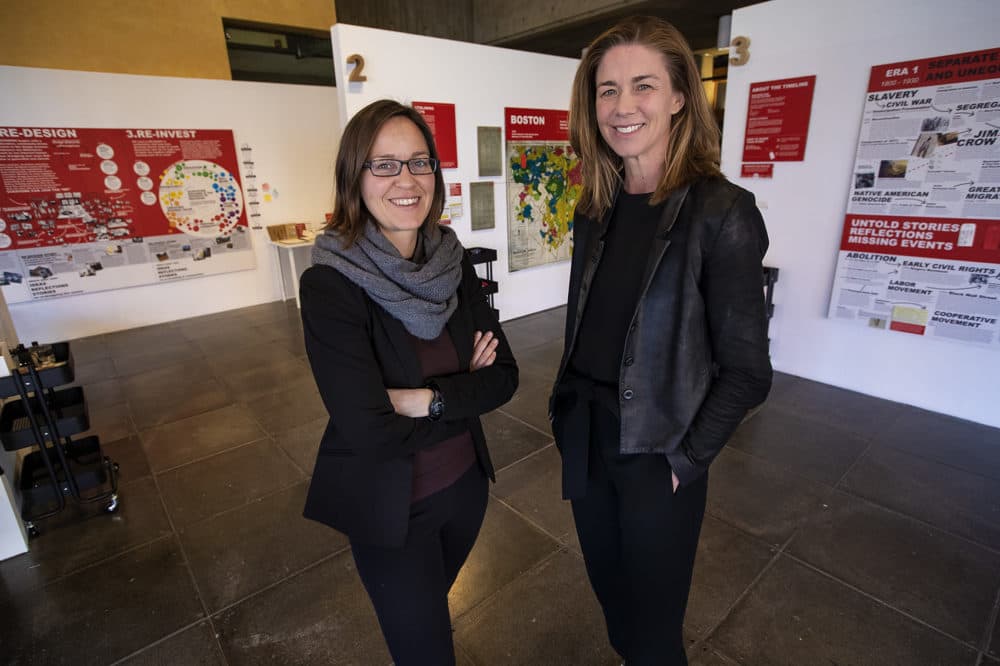 Nella Young, left, and Katherine Swenson at the &quot;Undesign the Redline: the Transformation of Race, Place, and Class in America&quot; exhibit at the Boston Architectural College. (Jesse Costa/WBUR)