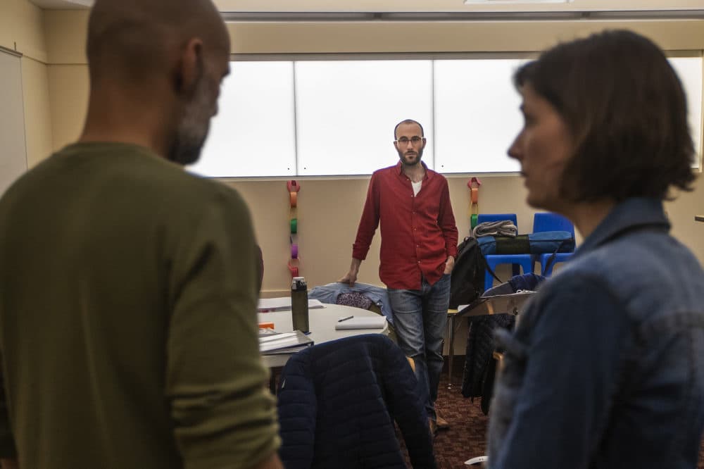 Guy Ben-Aharon works with actors Nael Nacer and Philana Mia on &quot;The Return.&quot; (Jesse Costa/WBUR)