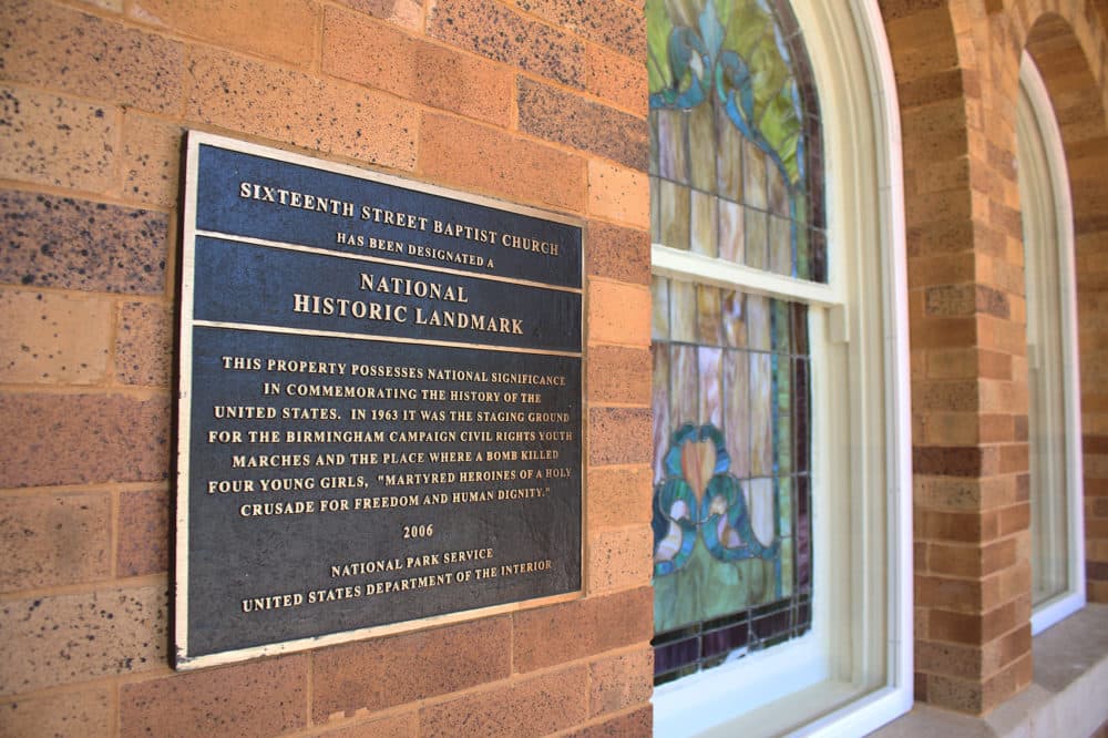 A plaque near the entrance of 16th Street Baptist Church in Birmingham, Ala. (Ciku Theuri/Here &amp; Now)