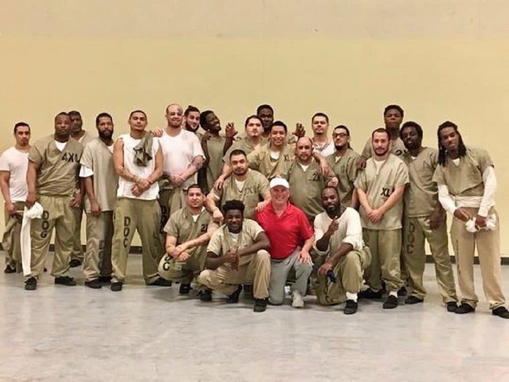 Detainees at Cook County and Roger BelAir pose for a photo. (Courtesy of Roger BelAir)