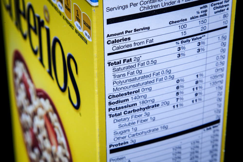 The nutrition facts label on the side of a cereal box is photographed in Washington. (J. David Ake, File/AP)