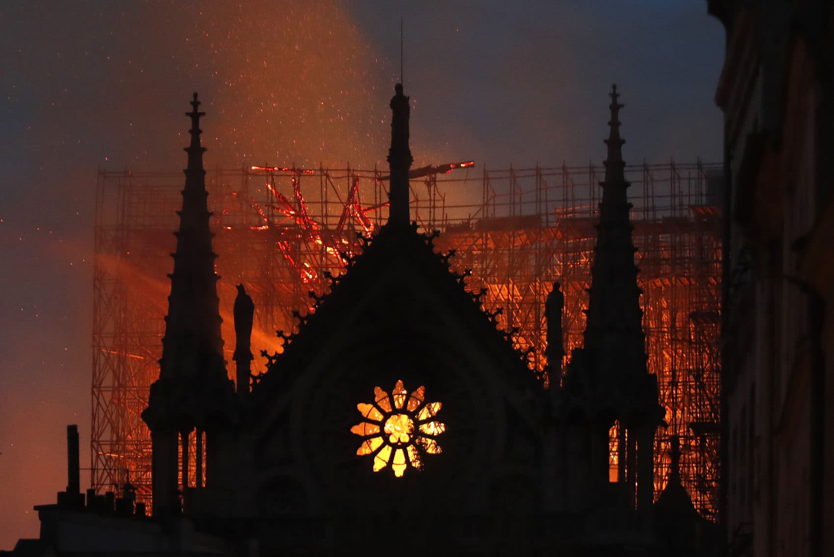 Flames and smoke rise from Notre Dame cathedral as it burns in Paris, Monday, April 15, 2019. (Thibault Camus/AP)