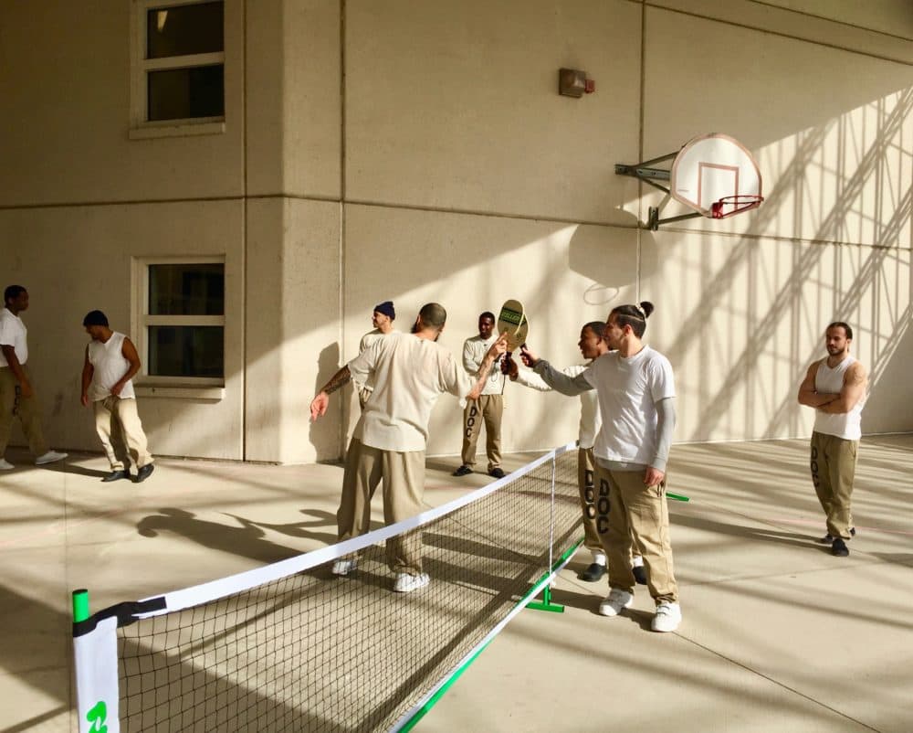 Detainees get ready for a pickleball match (Courtesy of Roger Bel Air)