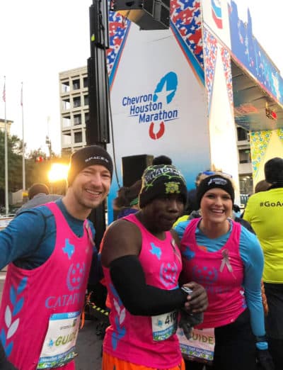 Nick Silver, center, and his guides Ben Stahl and Cheyenne Meyer at the 2019 Houston Half Marathon. (Courtesy Cheyenne Meyer)