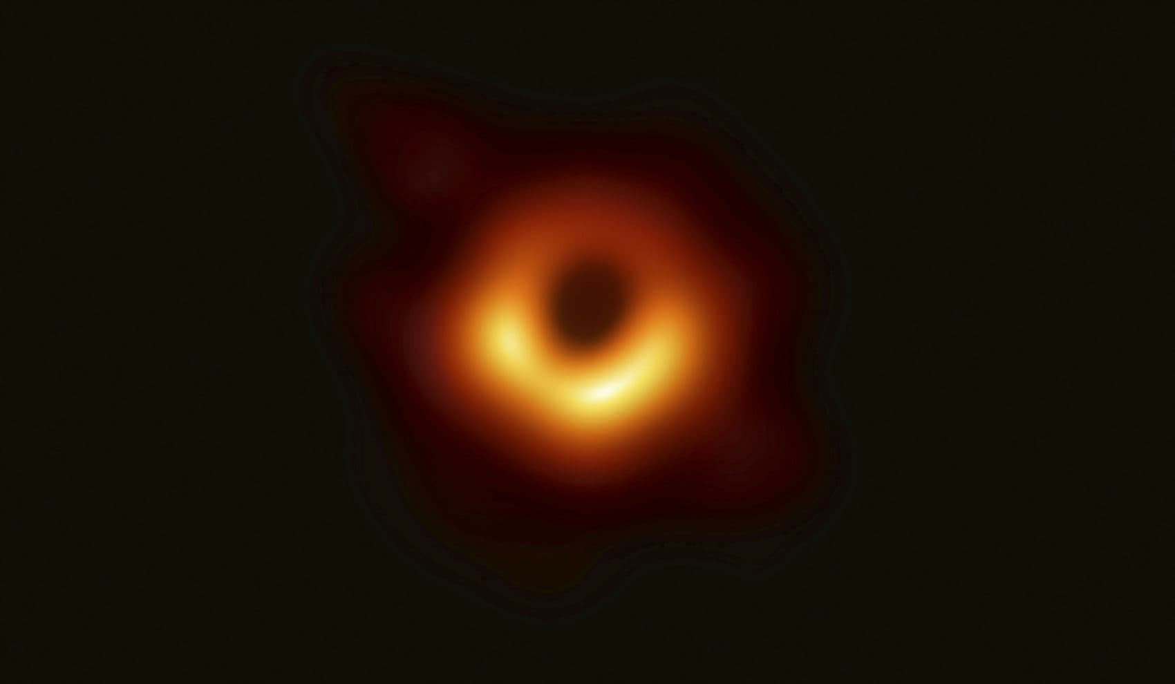 In 2019, scientists revealed the first image ever made of a black hole after assembling data gathered by a network of radio telescopes around the world. (Event Horizon Telescope Collaboration/Maunakea Observatories via AP)
