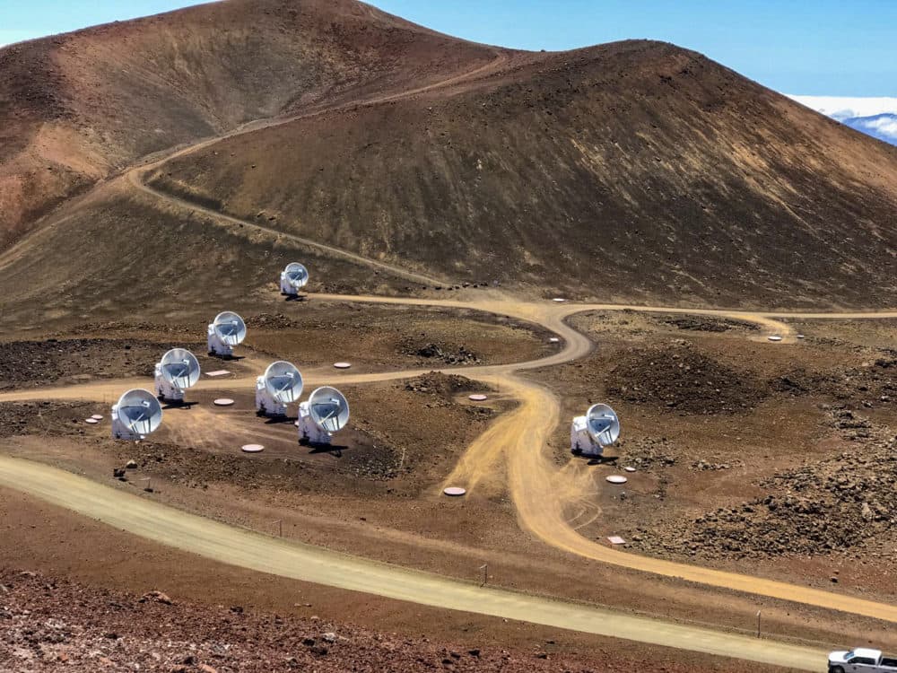This April 4, 2019, photo, provided by Maunakea Observatories shows the Submillimeter Array, part of the Event Horizon Telescope network on the summit of Mauna Kea, Hawaii. Scientists on Wednesday, April 10, revealed the first image ever made of a black hole using these telescopes. (Maunakea Observatories via AP)