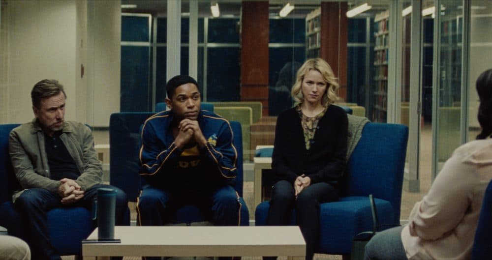 Luce (Kelvin Harrison, Jr.) sits with his adoptive parents, Amy and Peter Edgar (Naomi Watts and Tim Roth) in &quot;Luce.&quot; (Courtesy IFFB)