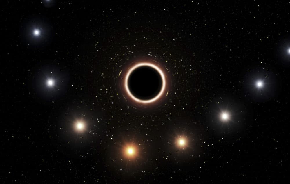 This artist's impression provided by the European Southern Observatory in July 2018 shows the path of the star S2 as it passes close to the supermassive black hole at the center of the Milky Way galaxy. As the star gets nearer to the black hole, a very strong gravitational field causes the color of the star to shift slightly to the red, an effect of Einstein's general theory of relativity. European researchers reported the results of their observations in the journal Astronomy &amp; Astrophysics on Thursday, July 26, 2018. (M. Kornmesser/ESO via AP)