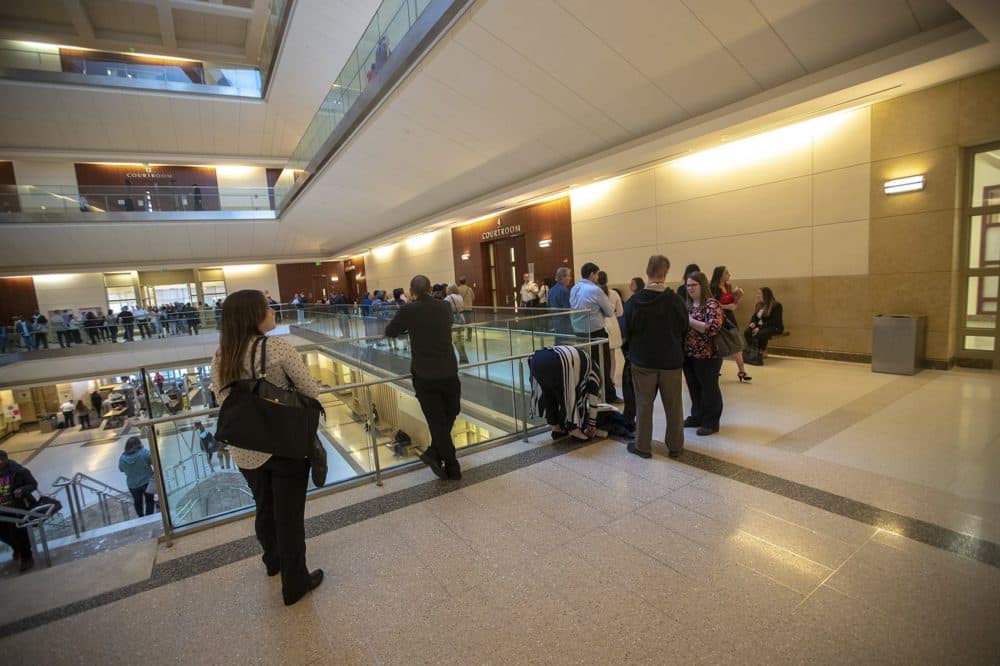 A typical Wednesday morning scene, with many people waiting outside of Worcester Juvenile Court (Jesse Costa/WBUR)