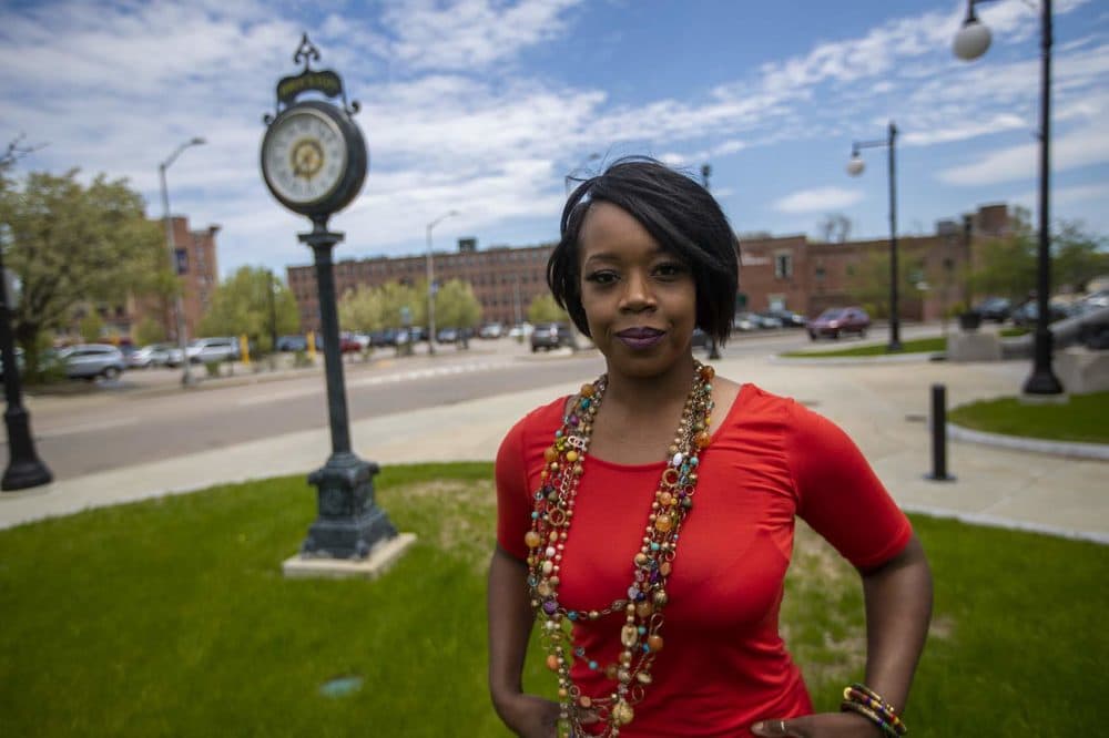 Shayna Barnes, who was the first black woman elected to the Brockton City Council, stands outside of City Hall. (Jesse Costa/WBUR)