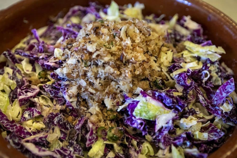 Indian-spiced coleslaw with fried shallots, coconut and lime. (Jesse Costa/WBUR)