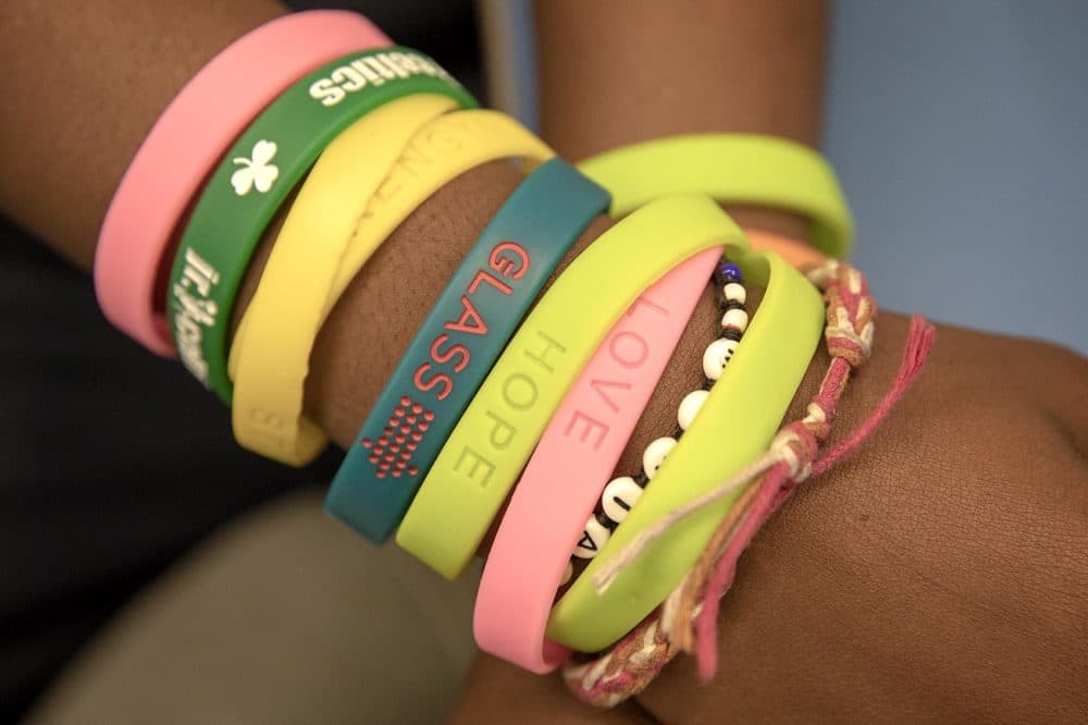 Seventh grader DJ Mitchell's wrist bands. (Robin Lubbock/WBUR)