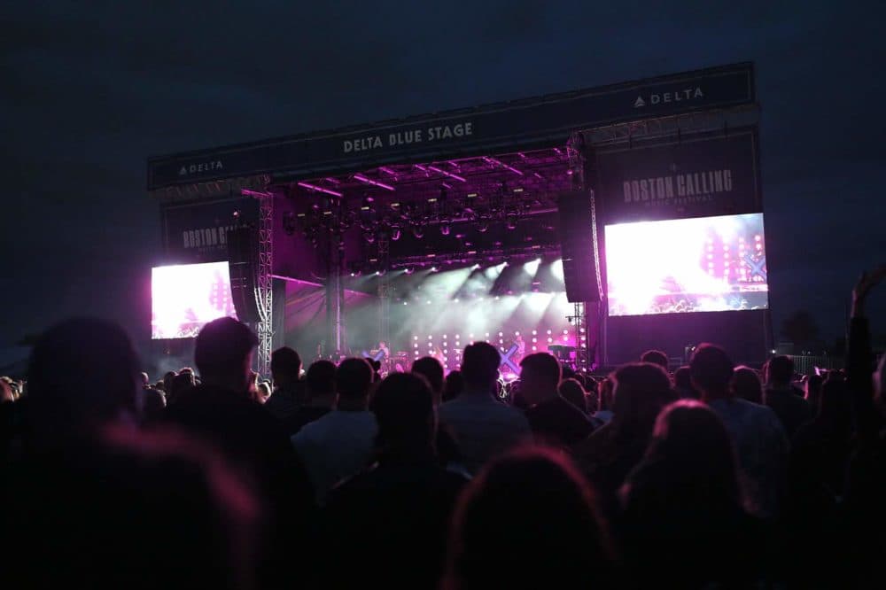 Crowds listen to CHVRCHES at the Blue Stage Friday night. (Hadley Green for WBUR)