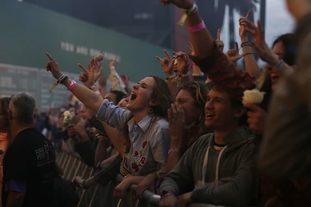 People sing to Greta Van Fleet on Friday evening. (Hadley Green for WBUR)