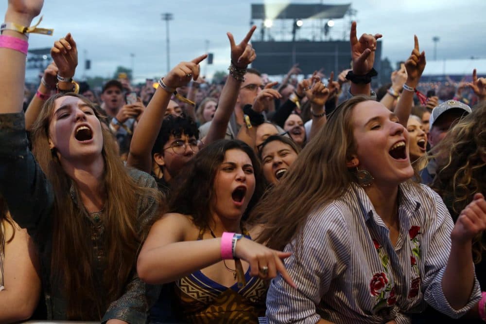 People sing to Greta Van Fleet on Friday evening at Boston Calling. (Hadley Green for WBUR)