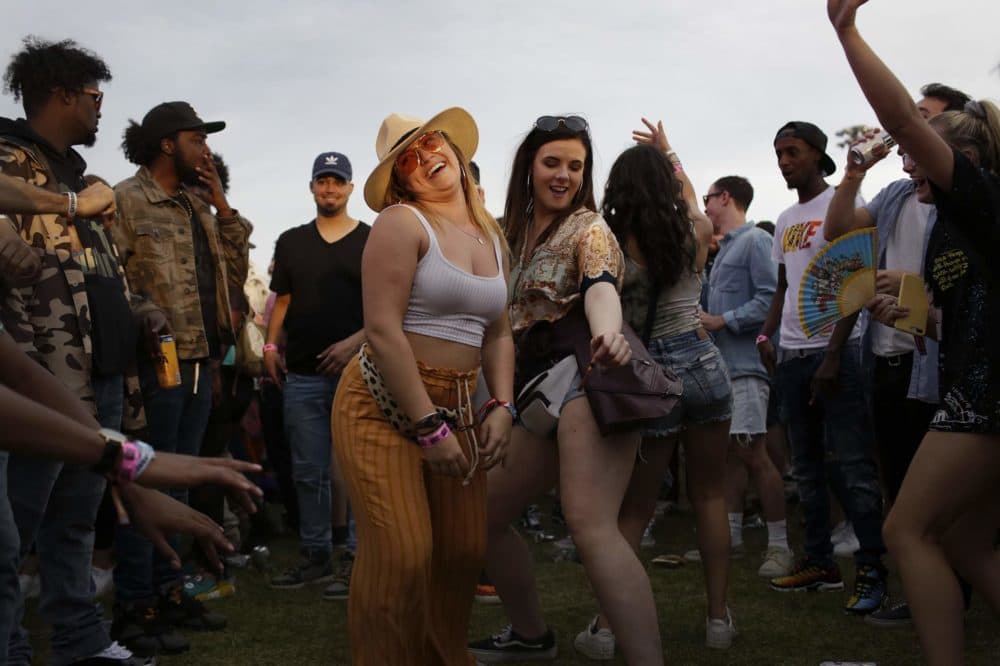 People dance during Anderson .Paak & The Free Nationals on Saturday at Boston Calling. (Hadley Green for WBUR)