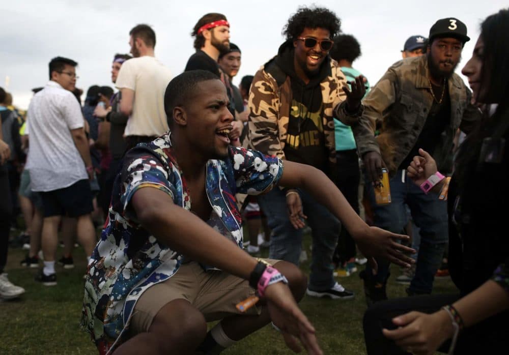 People dance during Anderson .Paak & The Free Nationals concert on Saturday evening. (Hadley Green for WBUR)