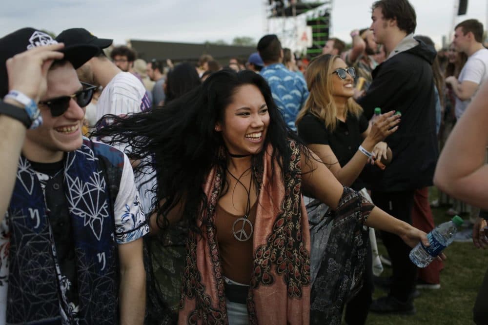 People dance during on Saturday at Boston Calling. (Hadley Green for WBUR)
