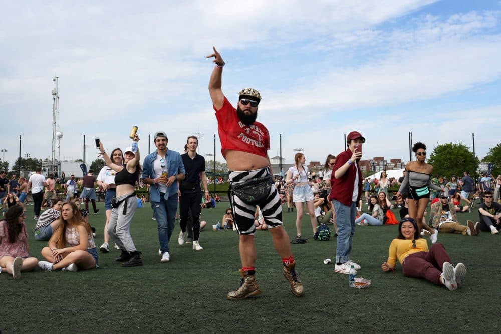 Joseph Burhoe, center, dances during Denzel Curry's performance on Saturday. (Hadley Green for WBUR)