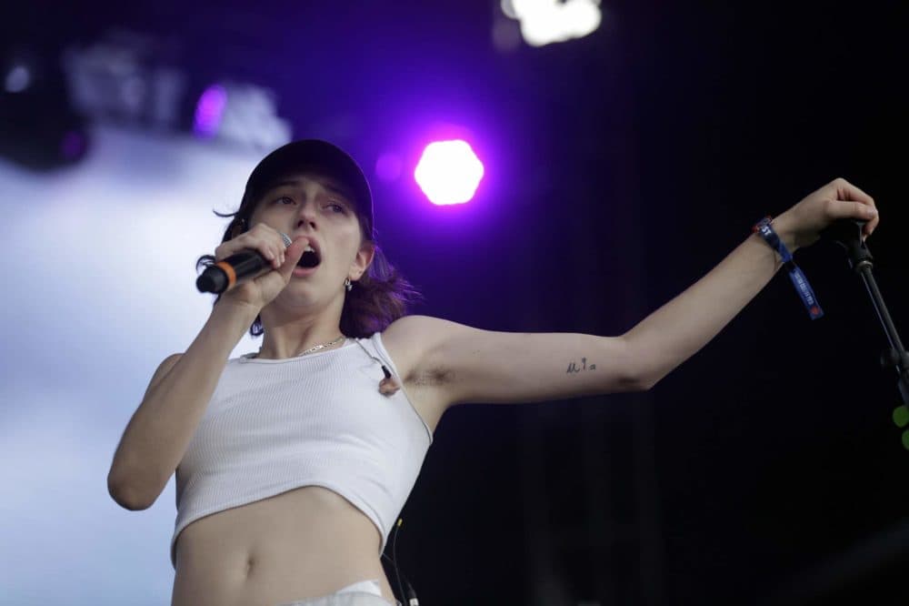 King Princess sings onstage during her Saturday evening set. (Hadley Green for WBUR)