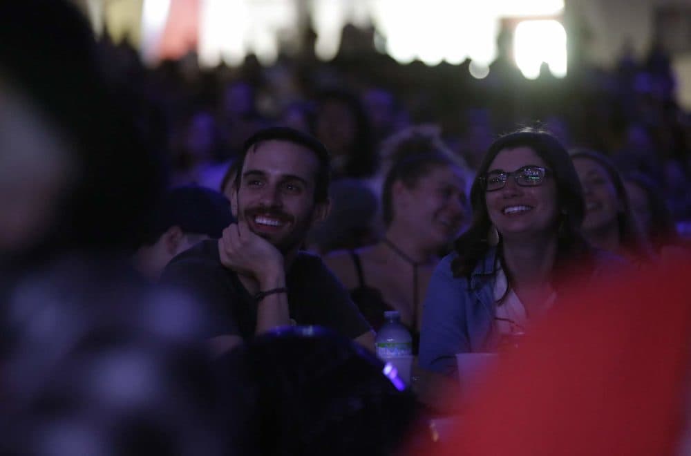 People listen to Jenny Slate on Saturday inside the arena. (Hadley Green for WBUR)