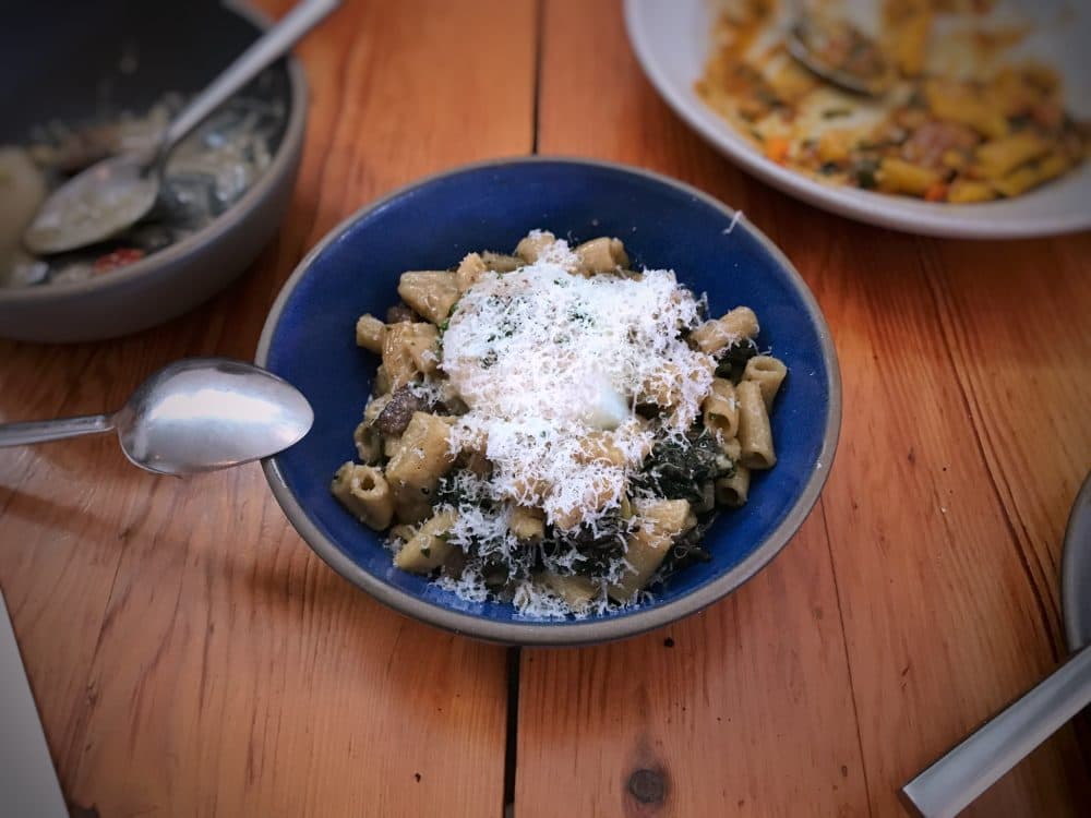 Spelt pasta with wild mushrooms, black cabbage and egg. (T.Tseng via flickr)