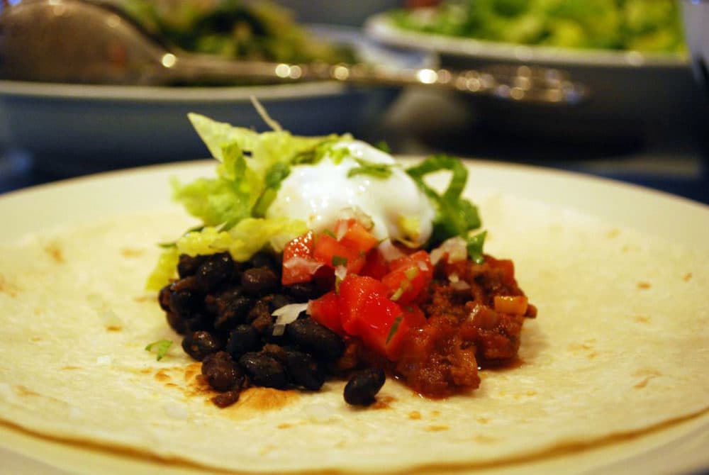 Turtle bean and chili con carne burrito. (Alpha via flickr)