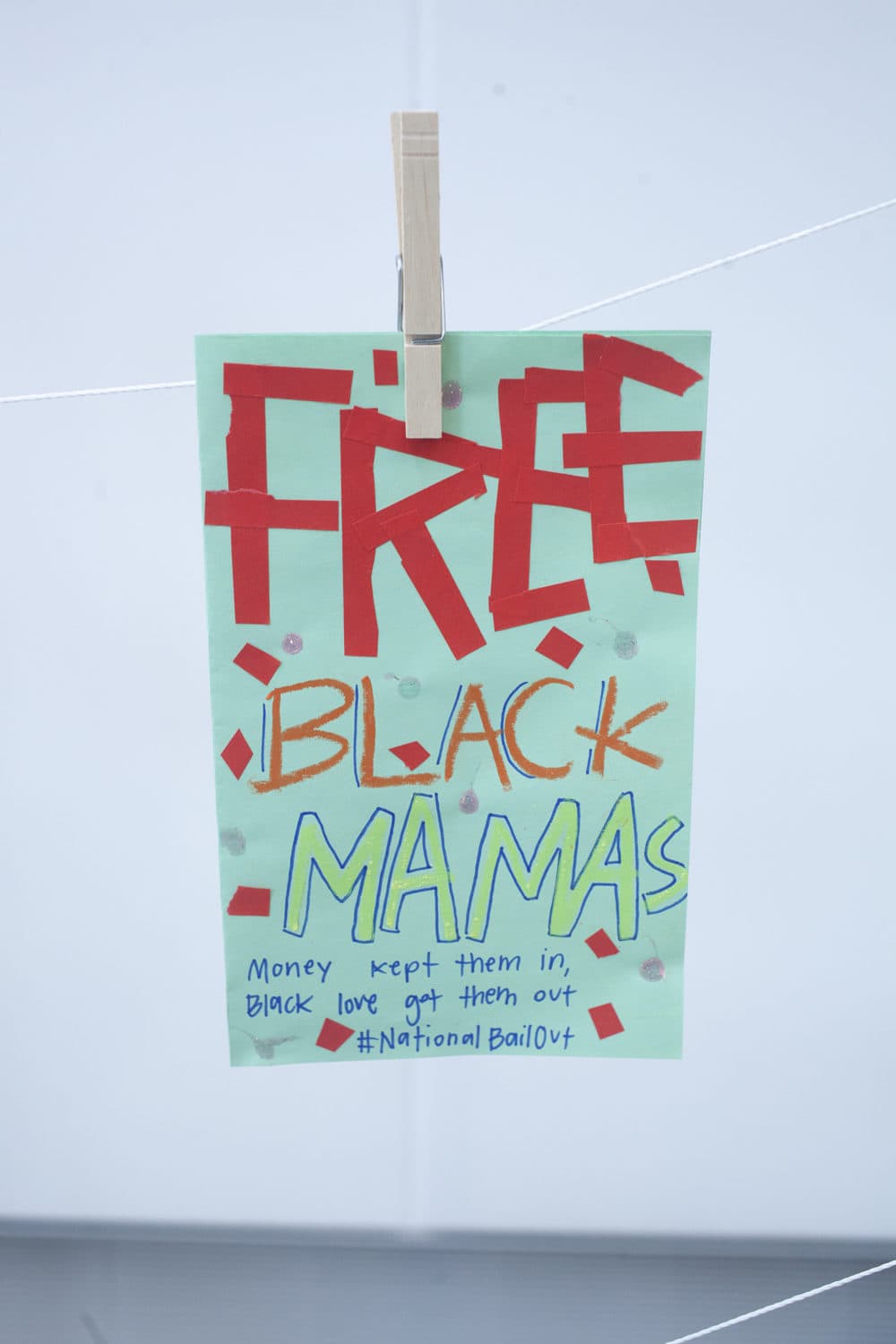 A flyer at the "Wee Free Black Mamas" bailout event (OJ Slaughter for WBUR)