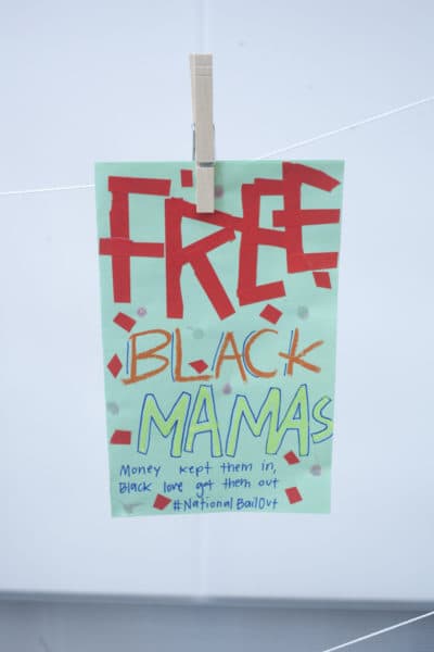 A flyer at the &quot;Wee Free Black Mamas&quot; bailout event (OJ Slaughter for WBUR)