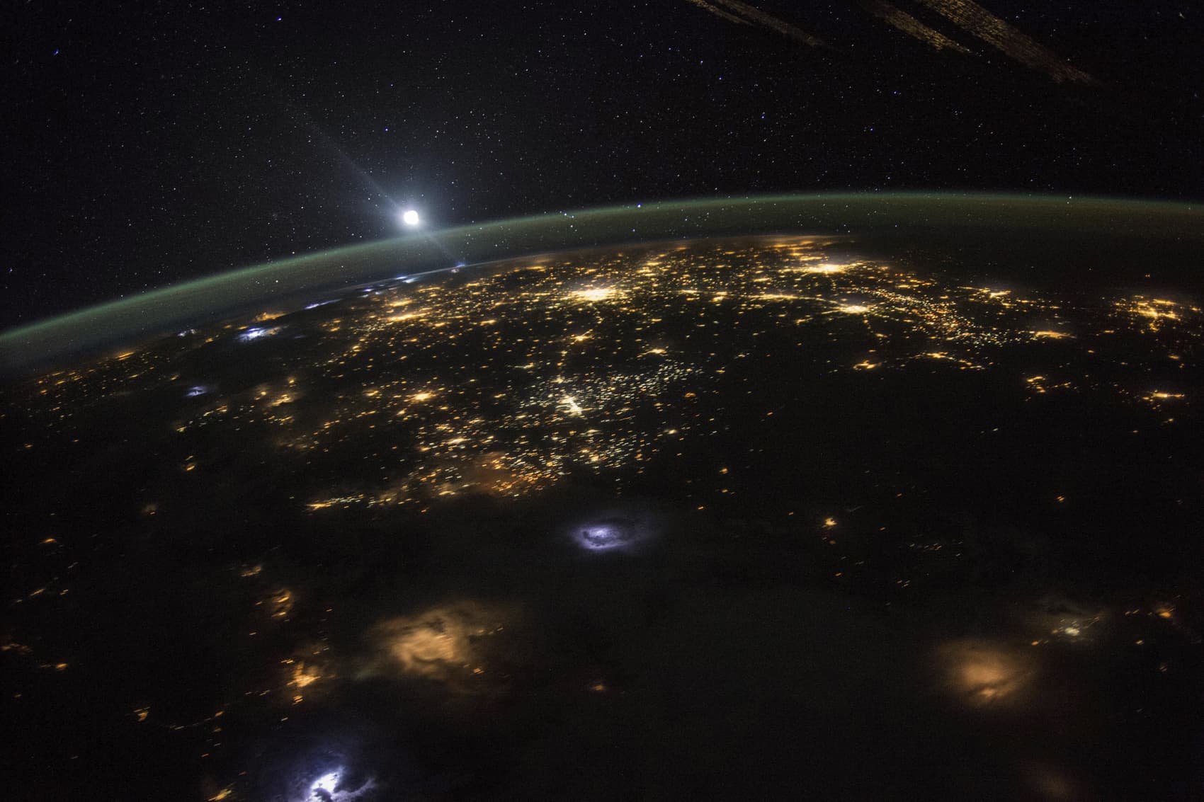 This Aug. 10, 2015 photo made available by NASA shows a sunrise from the vantage point of the International Space Station, about 220 miles above the surface of the Earth. (Scott Kelly/NASA via AP)