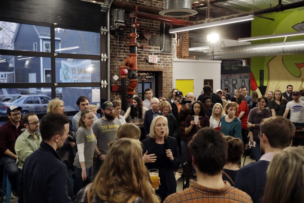 Democratic presidential candidate Sen. Kirsten Gillibrand, D-N.Y., middle, speaks during a campaign meet-and-greet, Friday, March 15, 2019, at To Share Brewing in Manchester, N.H. (Elise Amendola/AP)