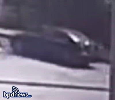 A black sedan with windows that appeared tinted was seen driving on Hiawatha Road toward Blue Hill Avenue at the time of a hit-and-run that killed a 57-year-old Boston woman Thursday, May 16, in Mattapan. (Courtesy Boston police)