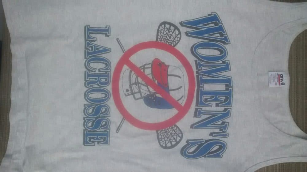 A shirt opposing the use of helmets in girls' lacrosse. (Courtesy Kathy Tomassetti)
