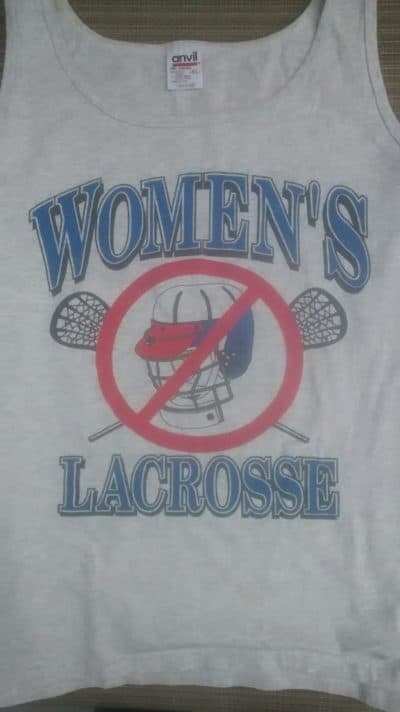 A shirt opposing the use of helmets in girls' lacrosse. (Courtesy Kathy Tomassetti)