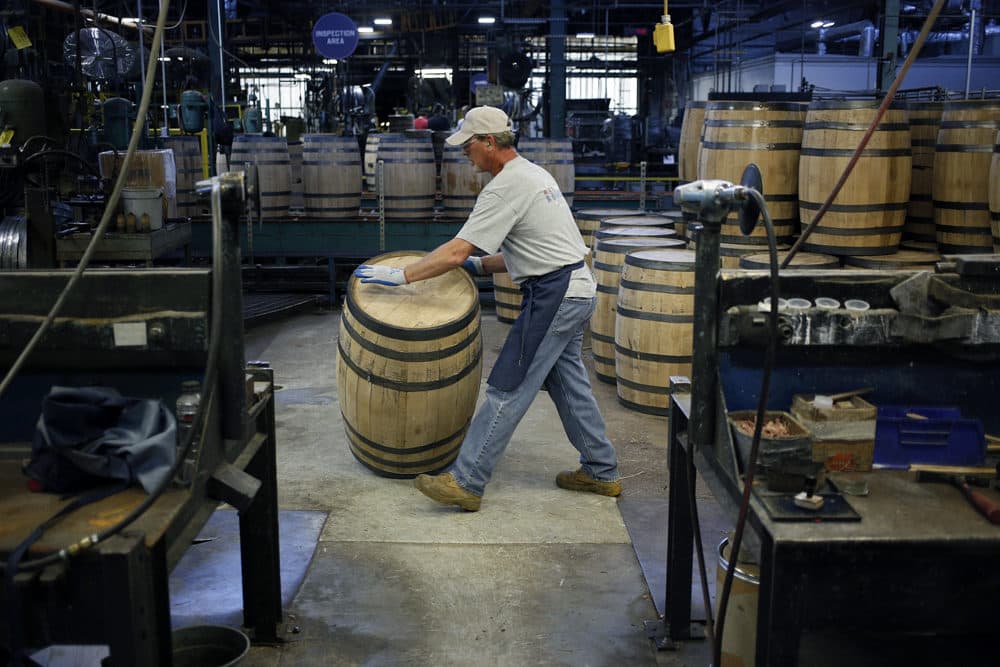 A cooper assembles a white oak bourbon barrel at the Brown-Forman Cooperage in Louisville, Ky.(Luke Sharrett for Here &amp; Now)