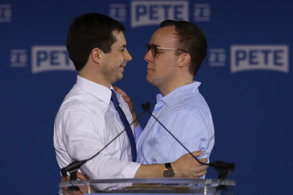 Pete Buttigieg is joined by his husband Chasten Glezman after he announced that he will seek the Democratic presidential nomination during a rally in South Bend, Ind., April 14, 2019.(Michael Conroy/AP)