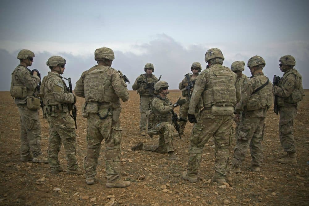 U.S. Soldiers gather for a brief during a combined joint patrol rehearsal in Manbij, Syria, Nov. 7, 2018. (U.S. Army photo by Spc. Zoe Garbarino)