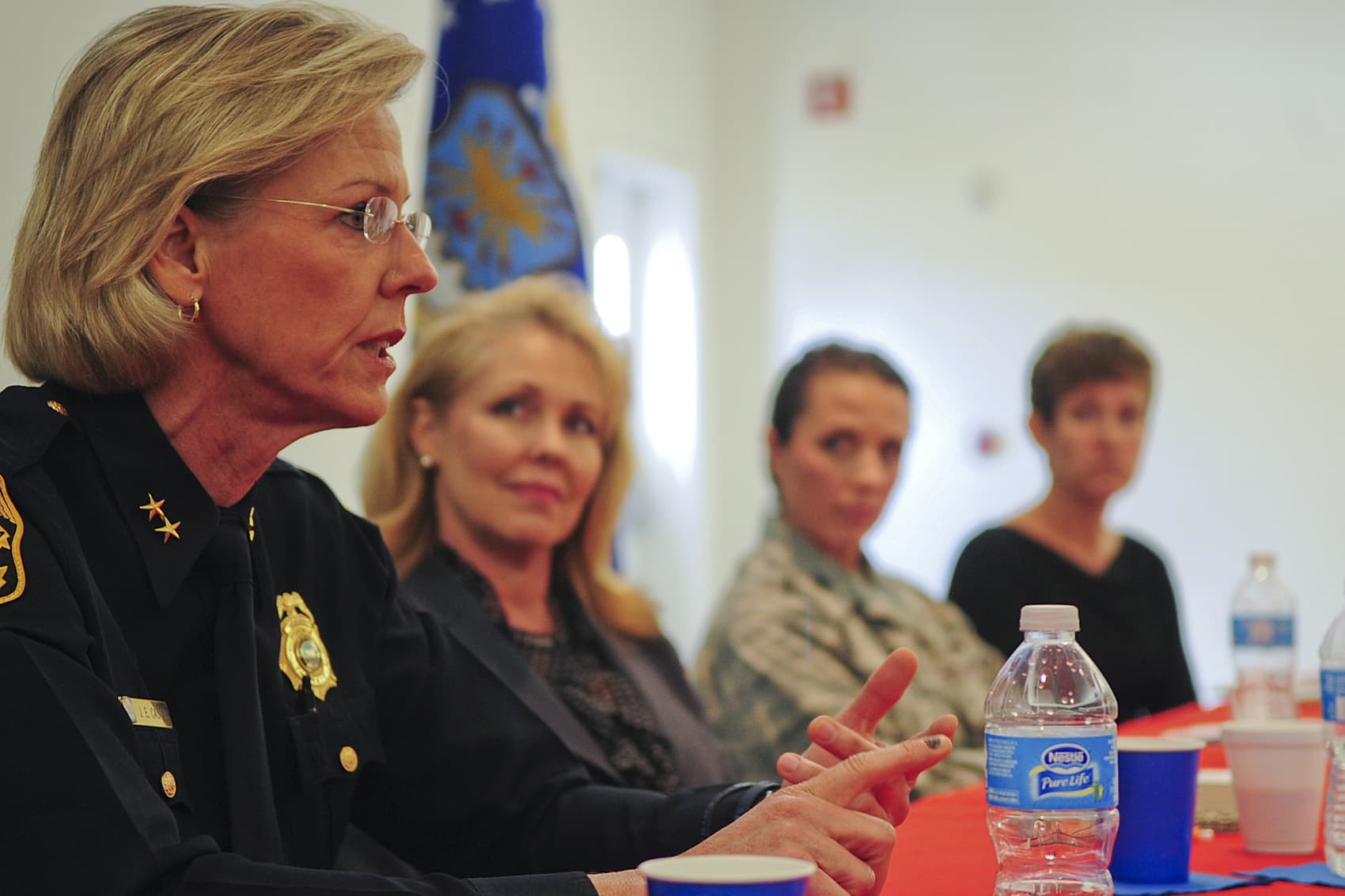 Jane Castor, former Tampa chief of police, answers questions from the audience during the Woman’s History Month panel held at the chapel on MacDill Air Force Base Fla., Mar. 23, 2012. (U.S. Air Force photo by Senior Airman Melissa V. Paradise)