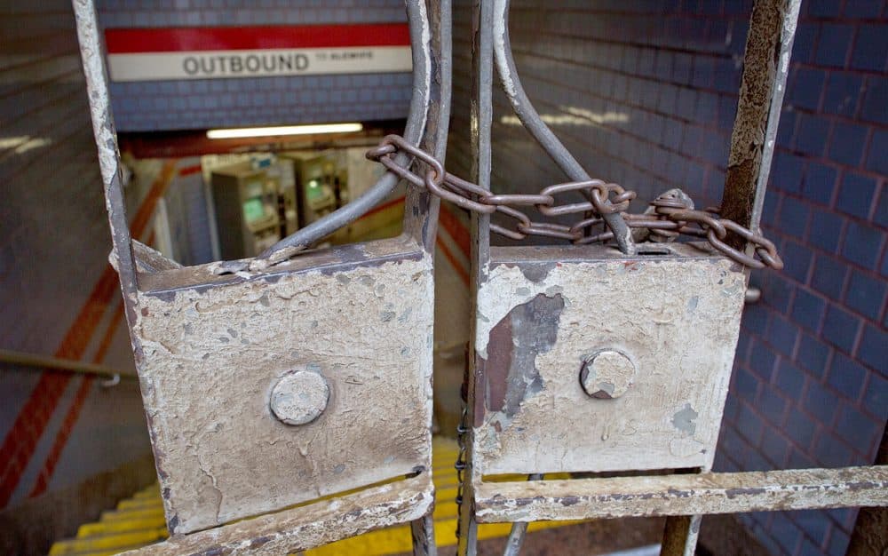 In this February 2015 file photo, the entrance to the MBTA Red Line at Central Square in Cambridge was chained closed on a weekday morning. (Robin Lubbock/WBUR)