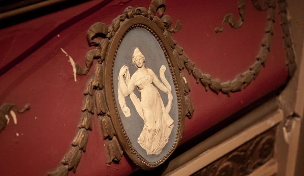 Detail from the front panel of an audience box at the balcony level of The Strand Theatre. (Robin Lubbock/WBUR)