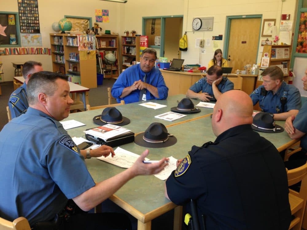 State and local police and educators discuss a recent safety drill at Farmington River Regional School in Otis, Massachusetts. (Nancy Eve Cohen/NEPR)