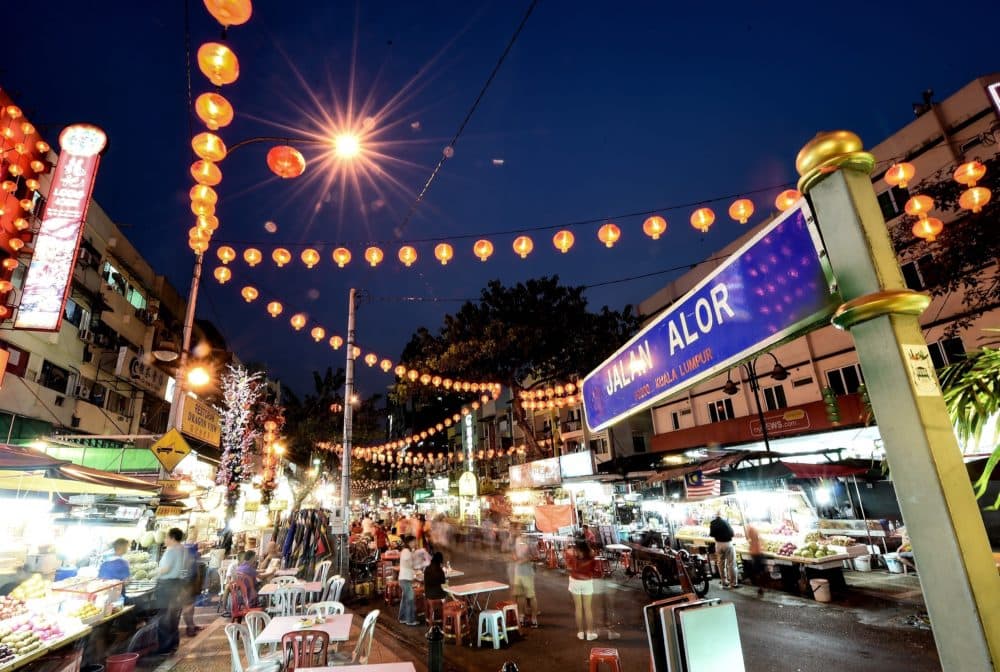 Foreign tourists and Malaysians visit the popular Jalan Alor food street in central Kuala Lumpur. (Manan Vatsyayana/AFP/Getty Images)