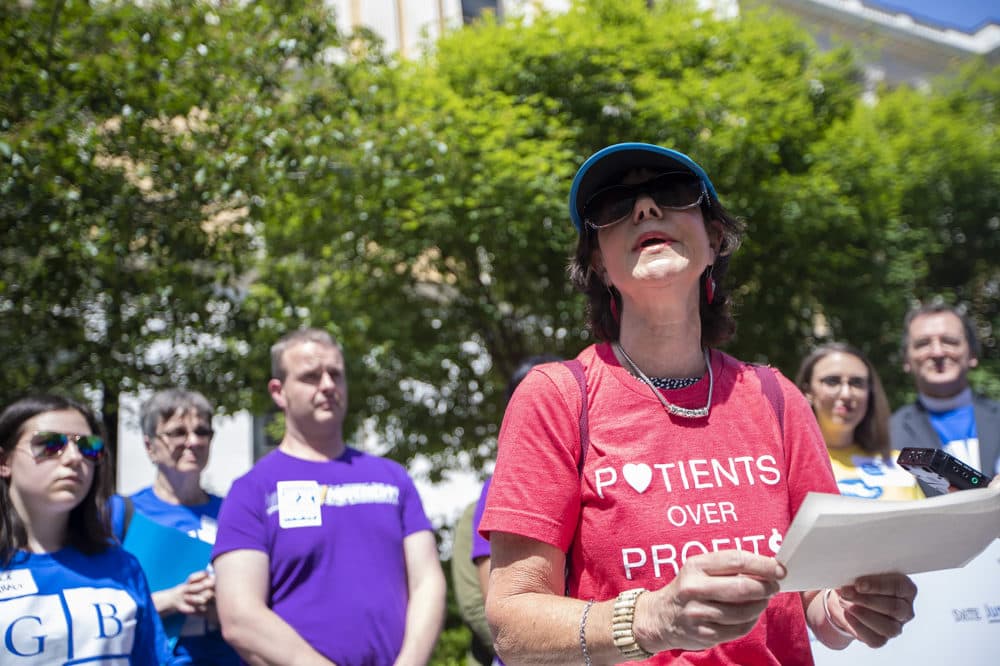 Deidre Waxman, who has type 1 diabetes, speaks during a rally outside the State House on June 12. (Jesse Costa/WBUR)