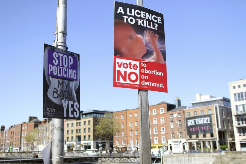 In this photo taken on May 17, 2018, pro and anti-abortion poster's on lampposts, in Dublin, Ireland. (Peter Morrison/AP)