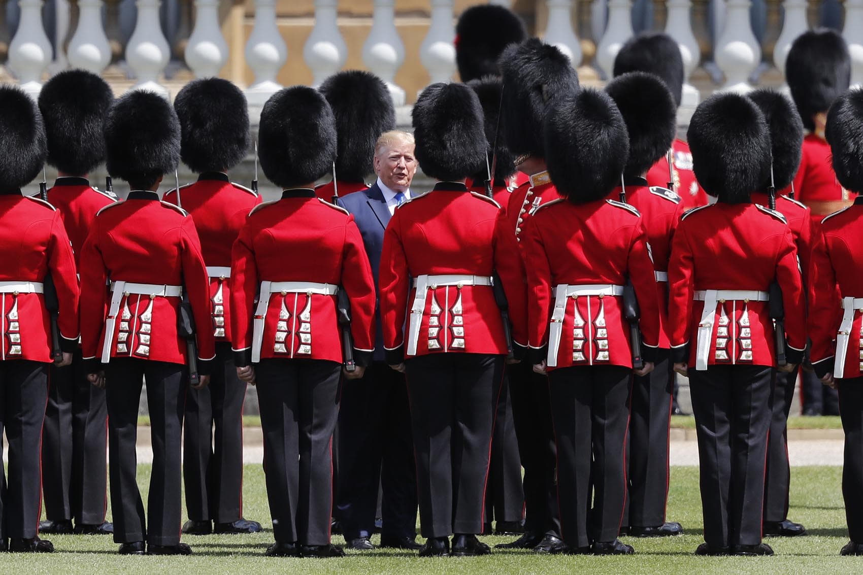 President Donald Trump reviews an honor guard during a ceremonial welcome in the garden of Buckingham Palace in London, Monday, June 3, 2019 on the opening day of a three day state visit to Britain. (Frank Augstein/AP)