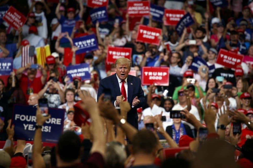 President Donald Trump pumps his fist after speaking during his re-election kickoff rally at the Amway Center, Tuesday, June 18, 2019, in Orlando. (Evan Vucci/AP)