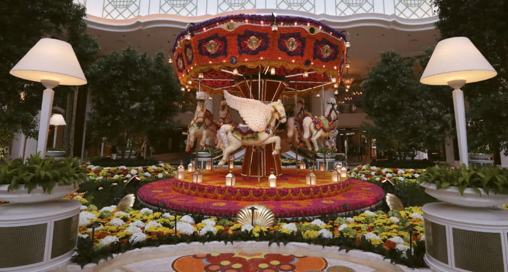 A ornamental floral carousel is displayed in the lobby of the Encore Boston Harbor casino. (Charles Krupa/AP)