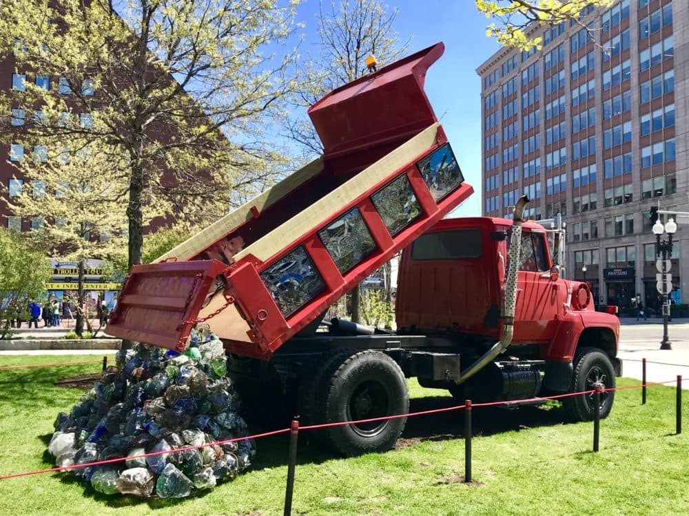 Karl Unnasch works with stained glass to portray life in blue-collar America. His work for &quot;The Auto Show&quot; recalls the work put in to the Big Dig. (Courtesy Rose Kennedy Greenway Conservancy)