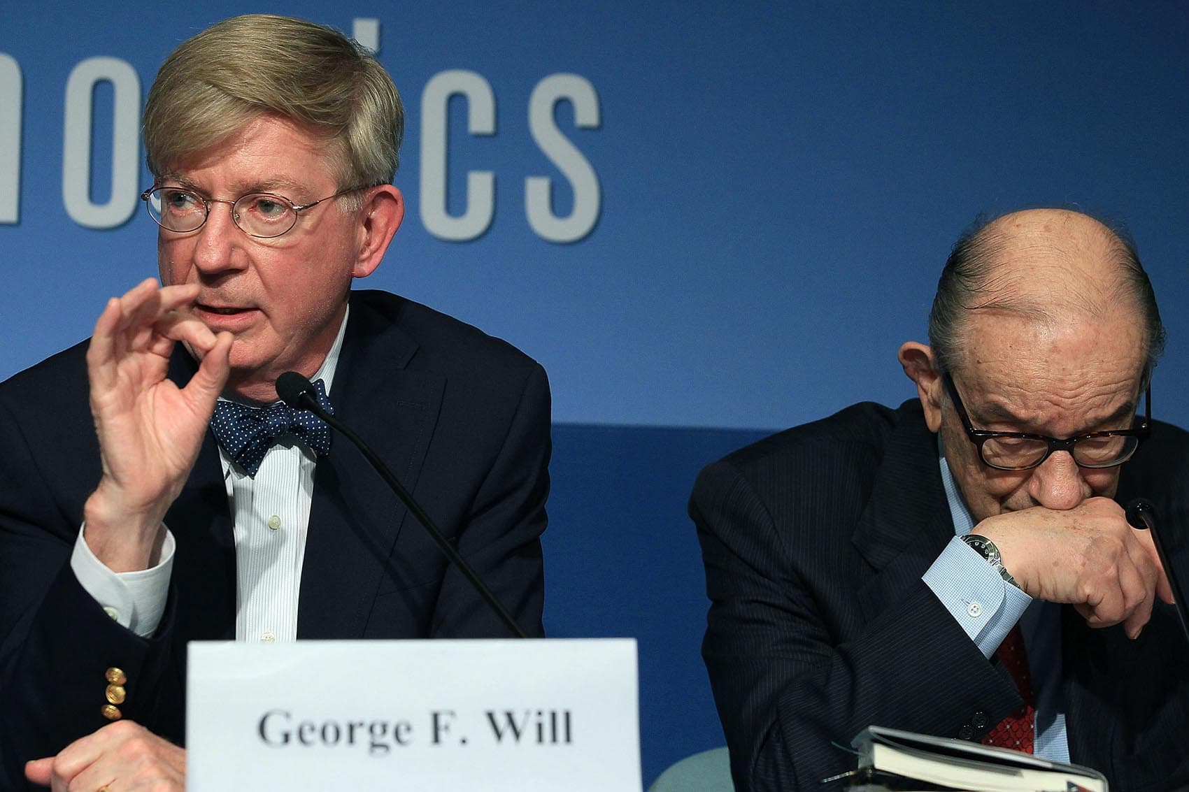 Former Federal Reserve Chairman Alan Greenspan (right) and columnist George Will participate in a discussion about the late U.S. Senator Daniel Patrick Moynihan, at the Peterson Institute for International Economics on Oct. 27, 2010. (Mark Wilson/Getty Images)