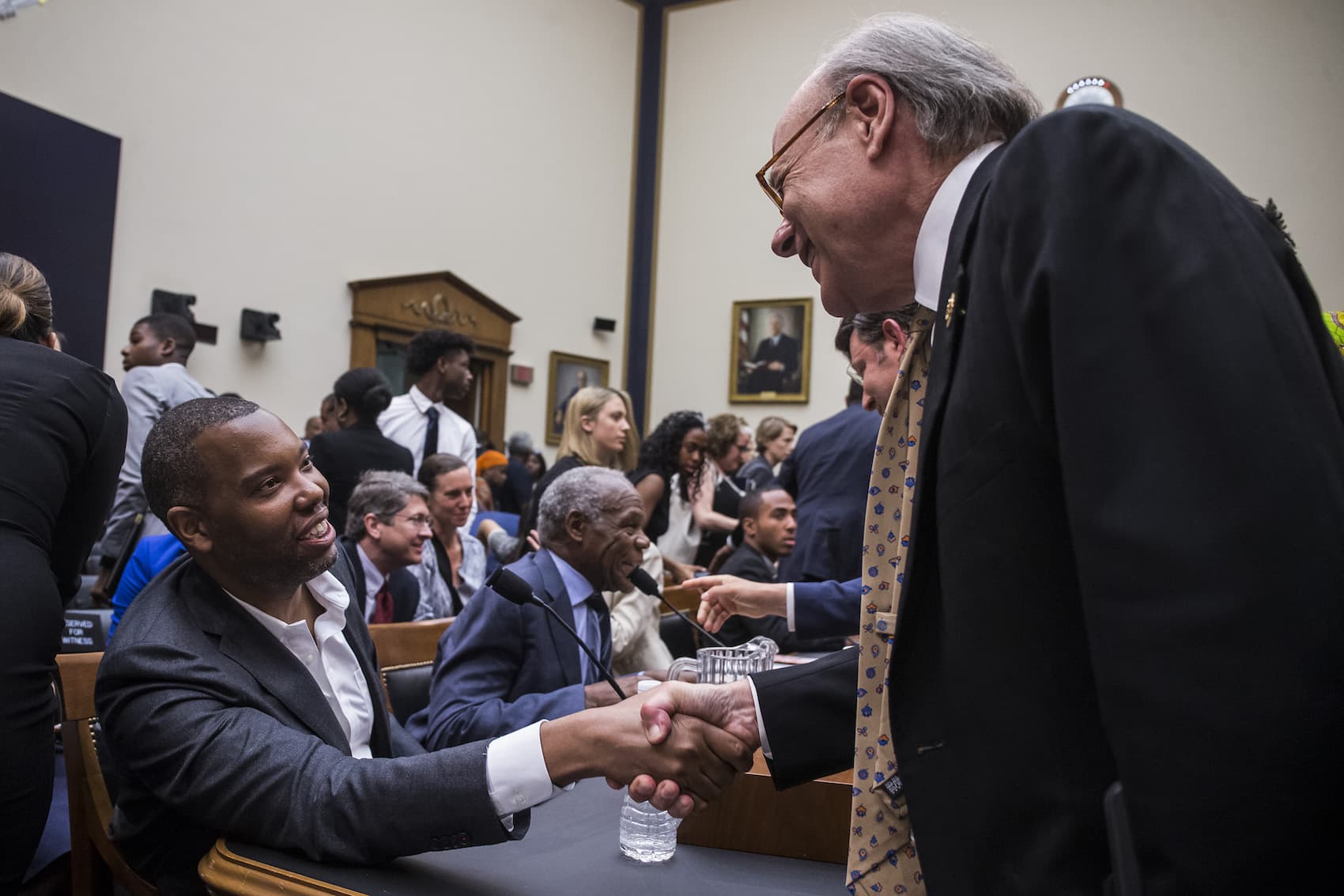 Writer Ta-Nehisi Coates shakes hands with House Subcommittee Chairman Steve Cohen, D-Tenn., during a hearing on slavery reparations held by the House Judiciary Subcommittee on the Constitution, Civil Rights and Civil Liberties on June 19, 2019 in Washington, D.C. (Zach Gibson/Getty Images)